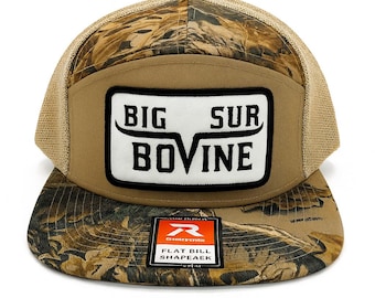 New Real Tree Camo Flat Bill Trucker Hat, Big Sur Bovine. SnapBack