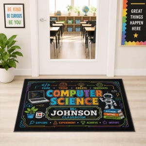 May include: A rectangular black classroom rug featuring colorful graphics including a laptop, a robot, and a stack of books labeled Python, HTML, and Javascript. The text reads Computer Science, Mr. Johnson Classroom, Think, Create, Innovate, Explore, Experiment, Achieve, and Inspire.