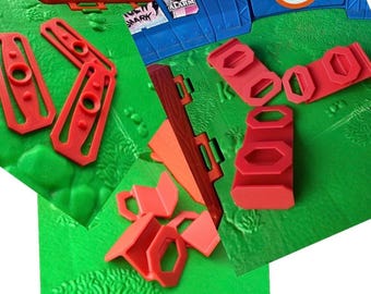 Hot Wheels track wall mounts and connectors