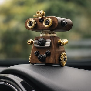 May include: A wooden robot ornament with brass detailing. The robot has a rounded head with two eye-like features, a rectangular body, and small wheels. The design incorporates screws and bolts, giving it a steampunk aesthetic. The ornament is displayed on a black surface.