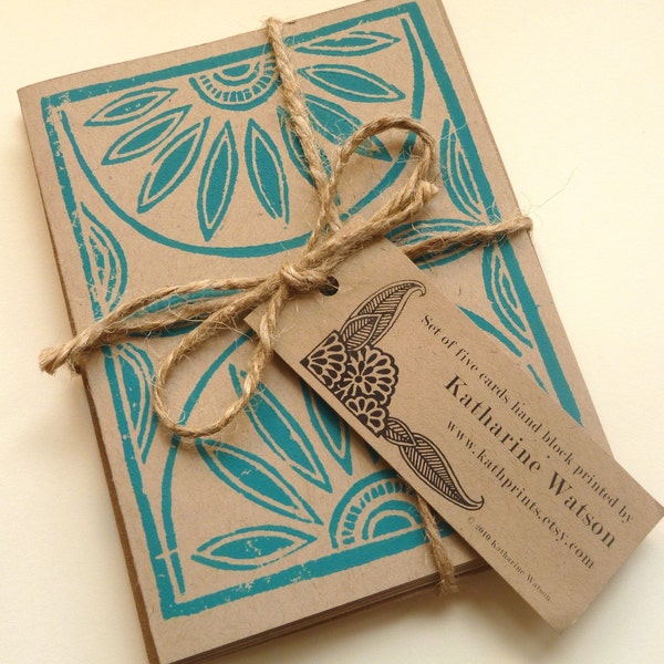 Five hand block printed cards and envelopes