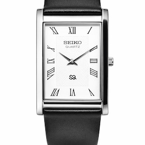 May include: A rectangular Seiko Quartz watch with a white face, black Roman numerals, and black hands. The watch has a silver-colored case and a black leather band. The watch face features the Seiko logo and a textured pattern.
