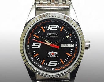 Reloj automático Citizen para hombre, estilo vintage, con esfera negra, mecánico japonés, con fecha y día.