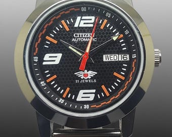 Reloj automático Citizen para hombre, estilo vintage, con esfera negra, mecánico japonés, con fecha y día.