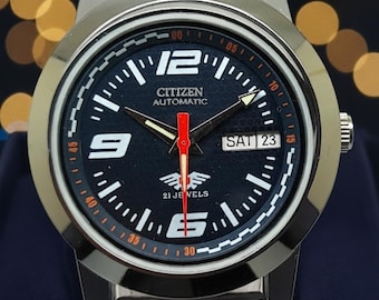 Reloj automático Citizen para hombre, estilo vintage, con esfera negra, mecánico japonés, con fecha y día.