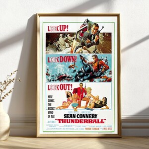 May include: A framed movie poster for "Thunderball" featuring Sean Connery. The poster has three panels with action scenes and the text "LOOK UP!", "LOOK DOWN!", and "LOOK OUT!". The bottom panel includes the film's title and credits.