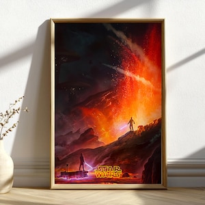 May include: A framed vertical wall art print depicting a Star Wars scene with two figures holding glowing lightsabers on a volcanic landscape. The artwork features intense orange and red lava, dark rocky terrain, and the yellow Star Wars logo.