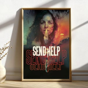 May include: Framed poster featuring a woman with long hair, holding a knife to her lips. The poster has the words "SEND HELP" in a bold, stylized font. The background has a dark, ominous color scheme with red and orange hues.