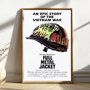 May include: A framed movie poster for Stanley Kubrick's "Full Metal Jacket." The poster features a military helmet with the words "Born to Kill" and a peace symbol. The poster's title is in bold, red letters.