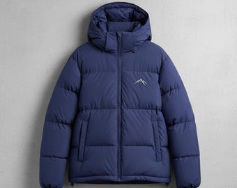 May include: A navy blue puffer jacket with a hood. The jacket has a front zipper closure and two side pockets. A small white mountain logo is embroidered on the upper left chest. The jacket is designed for warmth and protection from the elements.