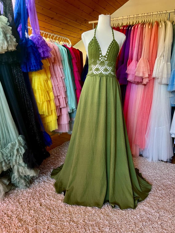 olive green one piece dress GREEN WITH ENVY CROCHET MIDI DRESS IN GREEN – AKIRA main image 0