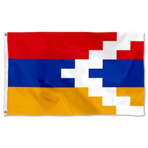 May include: A rectangular flag with a design featuring horizontal stripes of red, blue, and yellow. A white pattern is superimposed on the blue stripe. The flag has eyelets for hanging.