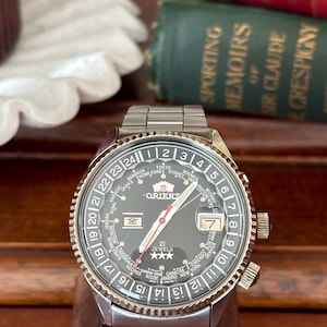 Zegarek Orient World Time „Marlin” JDM Automatic 21J z wewnętrznym obrotowym pierścieniem, lata 90.