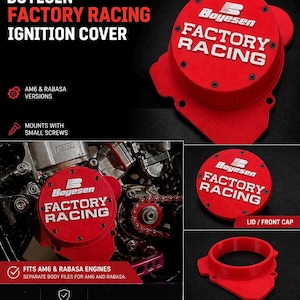 May include: A red Boyesen Factory Racing ignition cover for AM6 and Rabasa engines. The set includes a circular lid with white text, a mounting body, and small screws. The lid features the Boyesen logo and the words FACTORY RACING in white.