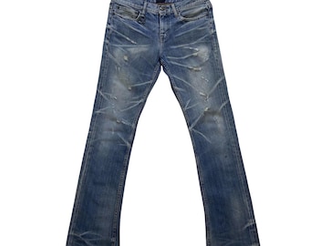 Vaqueros desgastados Flare Jackrose