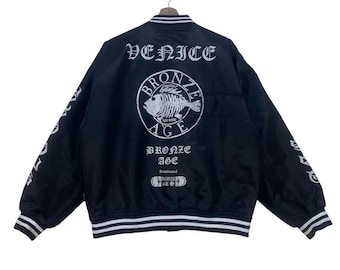 Y2K Skateboard Bronze Age Spell Out Big Logo New Bone Satin Polyester Jacket
