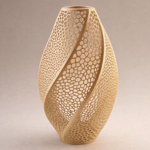 May include: A tall, beige-colored decorative vase with a unique, openwork design. The vase features a spiral pattern with a honeycomb-like texture, creating an intricate and airy aesthetic. The vase is approximately 12 inches tall.