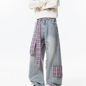 Plaid Patch Jeans | Wide Leg Denim Ribbon Detail | Daily Wear | Y2K Street Style

Wide leg denim jeans with plaid patch design and ribbon detail, perfect for casual outfits and Y2K street style fashion.
