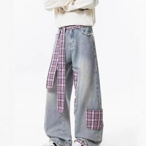 Plaid Patch Jeans | Wide Leg Denim Ribbon Detail | Daily Wear | Y2K Street Style

Wide leg denim jeans with plaid patch design and ribbon detail, perfect for casual outfits and Y2K street style fashion.