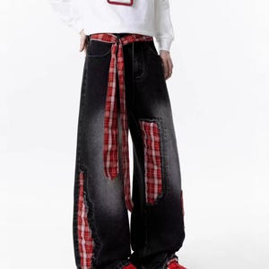 Plaid Patch Jeans | Wide Leg Denim Ribbon Detail | Daily Wear | Y2K Street Style

Wide leg denim jeans with plaid patch design and ribbon detail, perfect for casual outfits and Y2K street style fashion.