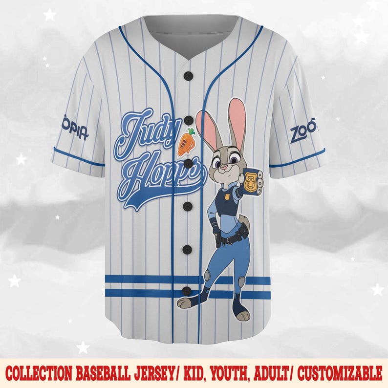May include: A white baseball jersey with thin blue pinstripes, featuring a graphic of Judy Hopps from Zootopia holding a badge. The text Judy Hopps is printed in blue script, with a small carrot icon and the Zootopia logo on the sleeves.