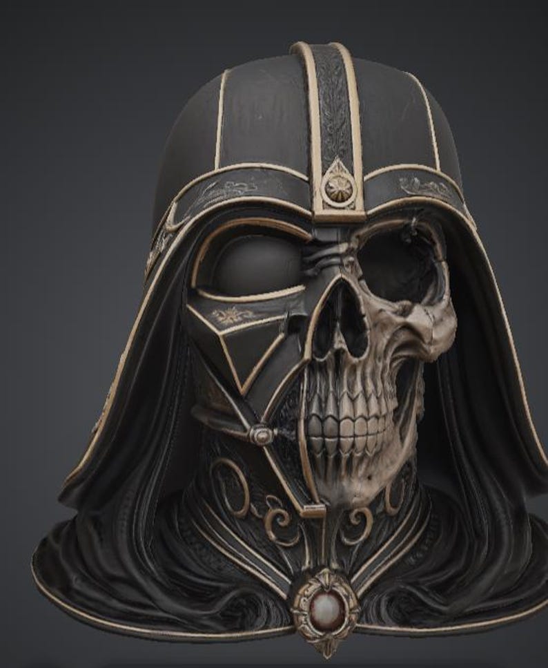 May include: A detailed bust of a character with a half-skull face and a black helmet with gold accents. The helmet has intricate designs and a flowing cape. The bust is a dark color with a metallic finish, creating a striking contrast.