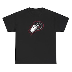 May include: Black t-shirt featuring a white ram head logo with gray and red accents. The ram head is a stylized design, with a focus on the horns and facial features. The shirt is a basic crew neck style.