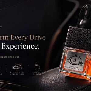 May include: A square glass car air freshener bottle with orange liquid, a black textured cap, and a hanging cord. The label features the text ADSCENT and a logo. The background displays the text Transform Every Drive Into an Experience.