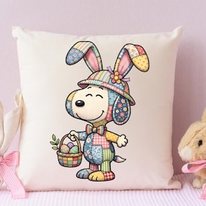 May include: A decorative pillow featuring a cartoon dog character dressed as an Easter bunny. The dog wears a patchwork hat and bow tie, holding a basket of Easter eggs. The design incorporates pastel colors and a floral accent.