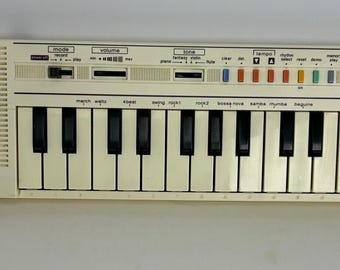 Casio PT-1 Vintage Child's Keyboard, Writing on Back, Small