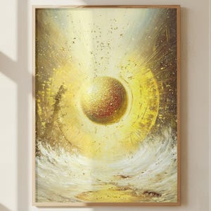 May include: Abstract art print featuring a golden orb at the center, surrounded by radiating light and a textured, swirling base. The artwork is framed in a light wood frame, creating a warm, inviting aesthetic. The color palette is dominated by gold, yellow, and white.