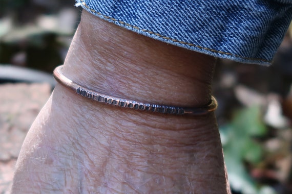 Hand-forged and hammered copper with real eco credentials — the kind of raw, artisan jewelry you can't find in any mall.
