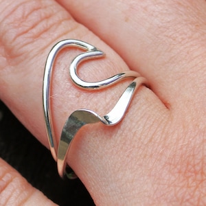 Stackable Silver wave rings handmade set of two. Great reminder of the beach, ocean, vacation. Popular and trendy set of rings great as gift