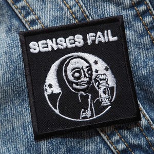 May include: A set of three ceramic nesting bowls in shades of blue, green, and white. The bowls feature a speckled design and varying sizes, perfect for food preparation or serving.