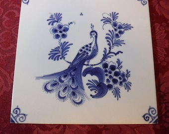 Carrelage bleu de Delft avec paon