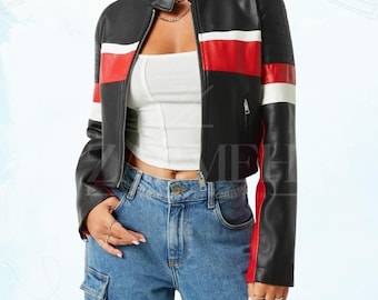 May include: Black cropped leather jacket with red and white stripes across the chest and sleeves. The jacket has a stand-up collar, a zipper closure, and a fitted silhouette. The jacket is paired with blue jeans.