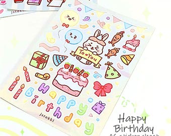 以下が含まれることがあります： 誕生日のテーマのA6ステッカーシート。ケーキ、プレゼント、風船、"To You"と書かれたバナーを持ったウサギ、ろうそく、そして"Happy Birthday"の言葉のカラフルなイラストが特徴です。