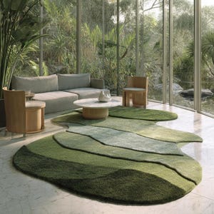 May include: A contemporary living room with a natural theme. Includes a grey sofa, wooden chairs, and a circular coffee table. A large, layered green rug and floor-to-ceiling windows overlook a verdant landscape.