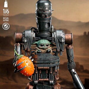 May include: A detailed action figure of IG-11 holding a fruit, with Grogu inside. The figure is metallic with copper accents. The fruit is orange with spiky protrusions. The figure is 1/6 scale. The text on the figure says "SW3D".