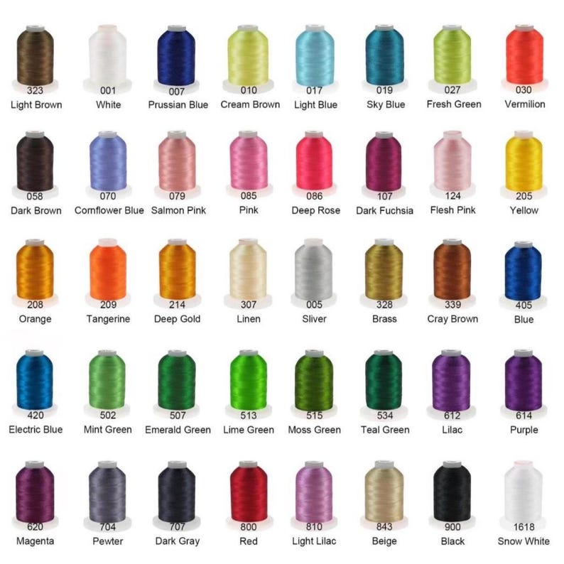 May include: A color chart displaying a variety of embroidery thread spools. The spools are arranged in rows and columns, showcasing a spectrum of colors from light brown to snow white, with color names and numbers.