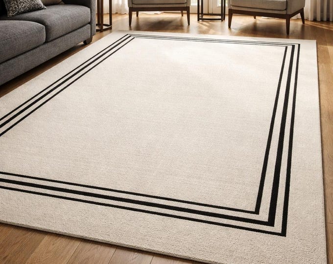 Featured listing image: Handmade Ivory Wool Rug | Modern Black Border, Custom Size
