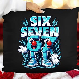 May include: Black pillow with the words "SIX SEVEN" in light blue, with cartoon figures of the numbers 6 and 7. The numbers have red noses, blue shoes, and white gloves. Lightning bolt graphics surround the numbers.