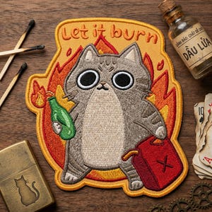 May include: Embroidered patch featuring a cartoon cat surrounded by flames, holding a green bottle and a red gas can. The patch has the text "Let it burn" in orange. Other items include matches, a lighter, and a small bottle.