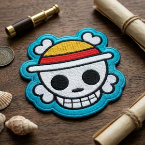 May include: A white ceramic mug with a black handle and the text "But First, Coffee" in a bold, black font. The mug is set against a blurred background, suggesting a cozy setting.