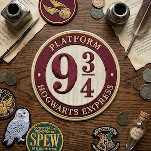May include: Circular patch with "Platform 9 3/4 Hogwarts Express" text in burgundy and gold. Other patches include a golden snitch, a snowy owl, and a green SPEW patch. Coins, a quill, and an inkwell are also present.