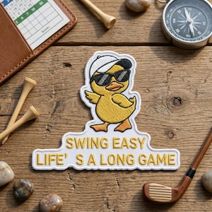 May include: A white ceramic mug with a black handle and the text "But First, Coffee" in a handwritten style. The mug is on a white surface. The mug is 4 inches tall.