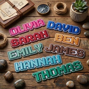 May include: A collection of eight embroidered name patches featuring pixelated block lettering in various colors including pink, blue, red, orange, green, and teal. The names displayed are Olivia, David, Sarah, Ben, Emily, James, Hannah, and Thomas.