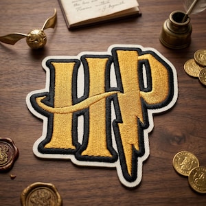 May include: A handmade, wooden serving tray with a natural finish. The tray features a rectangular shape with raised edges and integrated handles. The wood grain is visible, showcasing the tray's rustic charm. Ideal for serving food or displaying decorative items.