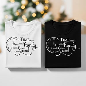 May include: Two t-shirts, one white and one black, each with a clock design and the text "Time spent with Family is worth every second." The design is in black and white.