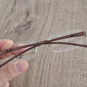 Ray-Ban RB8583 glasögonbågar utan bågar i titan – metallic brun – NOS bild 3